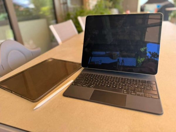 iPad Pro 4th generation including Magic Keypad, Apple Pencil and protective case.